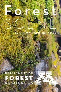 Cover of Forest Scene newsletter with white title text over green moss on stone